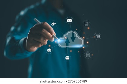 Businessman using stylus to interact with cloud computing interface for data upload and download. Concept for cloud technology, data storage, remote access, digital transformation, and networking.