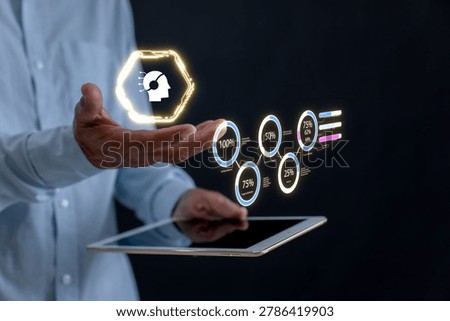 Businessman using tablet with AI analytics dashboard and virtual data interface, representing artificial intelligence, business automation, digital transformation, data analysis, and smart technology.