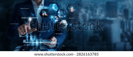 Businessman Using Tablet for Analyzing Mobile Commerce Data. Monitoring mobile transactions, improving online shopping experiences, analyzing customer behavior, digital commerce solutions.