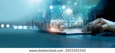 Businessman using tablet and fingerprint scanning unlock and access to business data network. Biometric identification and cyber security protect business transaction from online digital cyber attack.