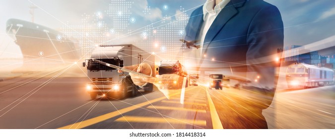 Businessman using tablet logistic network distribution   smart transportation   networking intelligent logistics truck   train container cargo ship  Logistic import export   industry  
