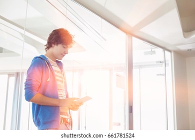 Businessman using tablet PC in creative office - Shutterstock ID 661781524