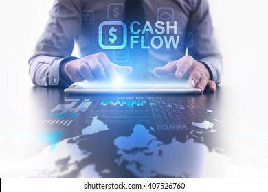 Businessman Using Tablet Pc And Select Cash Flow.