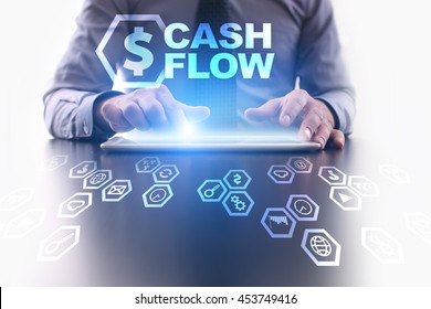 Businessman Is Using Tablet Pc And Selecting Cash Flow Icon.