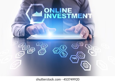 Businessman is using tablet pc and selecting Online Investment icon.