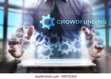 Businessman using tablet pc and selecting crowdfunding.