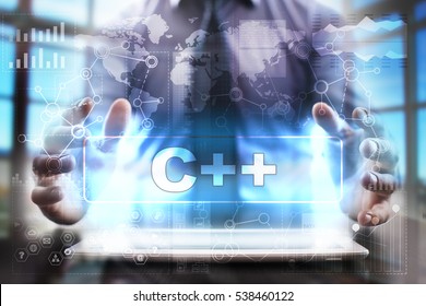 Businessman using tablet pc and selecting c++.