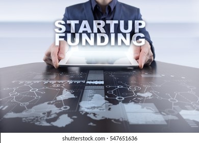 Businessman Using Tablet Pc And Selecting Startup Funding.