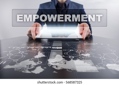 Businessman using tablet pc and selecting empowerment.