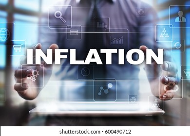 Businessman using tablet pc and selecting inflation.