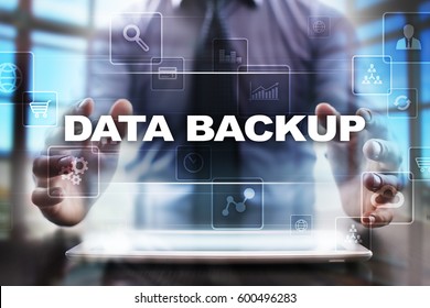 Businessman Using Tablet Pc And Selecting Data Backup.