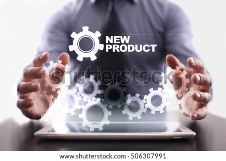 Businessman is using tablet pc and selecting new product