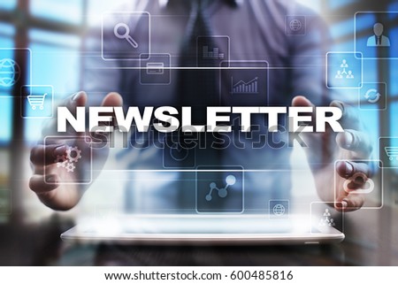 Businessman using tablet pc and selecting newsletter.
