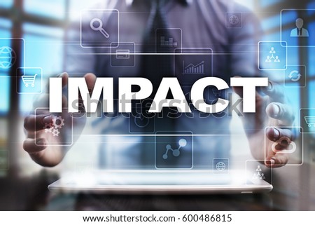 Businessman using tablet pc and selecting impact.