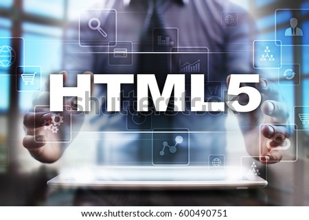 Businessman using tablet pc and selecting html5.