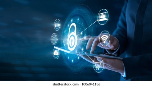 Businessman using tablet and set up network connection with shield guard to protected from cyber attacks. Network security system concept - Shutterstock ID 1006041136