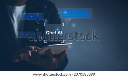 Businessman using tablet show AI chat with virtual screen internet connection to create command prompts with artificial intelligence robot technology, concept of futuristic technology transformation.