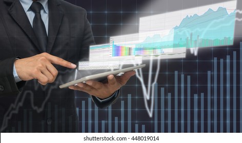 Businessman Using The Tablet Shown The Trading Graph Of Stock Market On The Virtual Screen Over The Stock Chart Background, Business Stock Market Concept