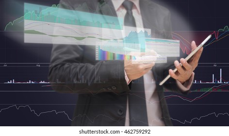 Businessman Using The Tablet Shown The Trading Graph Of Stock Market On The Virtual Screen Over The Stock Chart Background, Business Stock Market Concept
