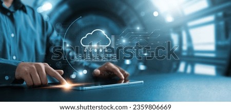 Businessman using tablet to transfer data on cloud computing, seamless data transfer and strong internet security, server based communication on social networks, servers and storage.