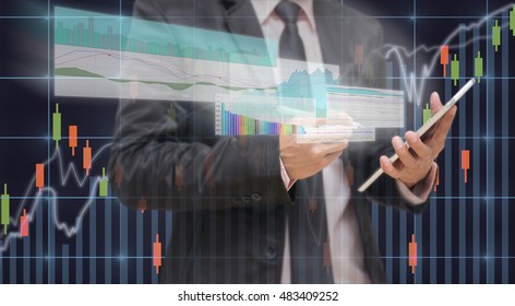 Businessman Using The Taplet Shown The Trading Graph Of Stock Market On The Virtual Screen Over The Stock Chart Background, Business Stock Market Concept