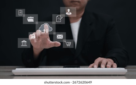 Businessman using touchscreen to interact with virtual dashboard displaying cloud, email, and e-commerce icons, symbolizing modern business solutions.	