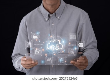 Businessman using transparent digital tablet shows the virtual screen with icon document data technology and efficient online storage. Big data technology and internet concept.  - Powered by Shutterstock