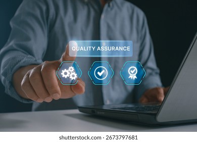Businessman using virtual interface for quality assurance, demonstrating modern technology in quality control, management and software testing for industry standards compliance. ISO certification.