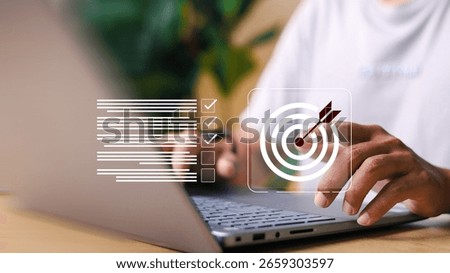 Businessman using virtual interface to set goals and manage checklist tasks on computer. Concept of productivity, planning, digital transformation, and workflow efficiency.