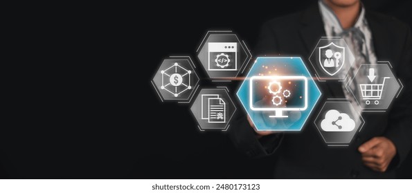 Businessman using virtual screen to interact with shareware concept icons, emphasizing software distribution, cloud computing, and digital marketing.