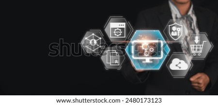 Businessman using virtual screen to interact with shareware concept icons, emphasizing software distribution, cloud computing, and digital marketing.