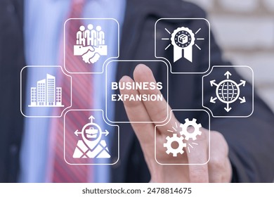 Businessman using virtual screen presses text: BUSINESS EXPANSION. Web business expansion such as teamwork, sales, marketing, strategy, distribution network, franchise. Concept of business expansion.