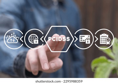 Businessman using virtual touch screen clicks abbreviation: PCI DSS. Concept of PCIDSS - Payment Card Industry Data Security Standard. PCIDSS payment security standard conceptual presentation.