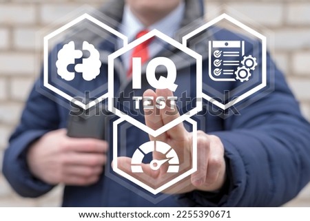 Businessman using virtual touch screen presses the inscription: IQ TEST. IQ Success Business Education Intelligence Work Concept. Assessment of intelligence quotient.