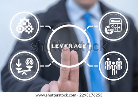 Businessman using virtual touch screen presses word: LEVERAGE. Concept of leverage in business, finance. Leverage investing. Investor borrow money or stock to increase potential return.