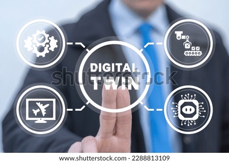 Businessman using virtual touchscreen presses the inscription: DIGITAL TWIN. Digital twin concept. Vritual model exchanging data, system simulation and monitoring. Machine learning.