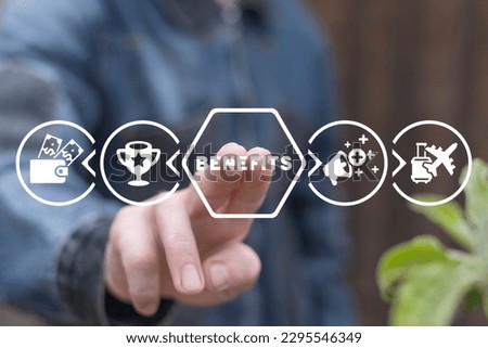 Businessman using virtual touchscreen presses text: BENEFITS. Concept of Employee Benefits. Business bonuses, worker perks, career.