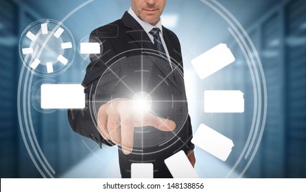 Businessman using wheel interface in data center