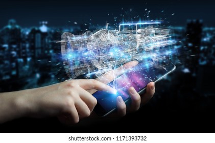 Businessman using wireframe holographic 3D digital projection of an engine with mobile phone - Shutterstock ID 1171393732