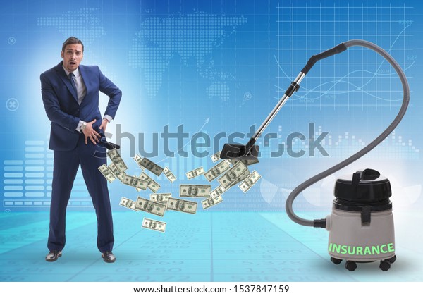 Businessman\
and vacuum cleaner sucking money out of\
him