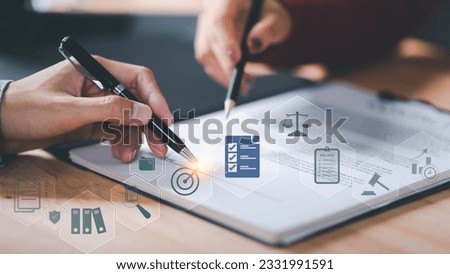 Businessman validates and manages business documents and agreements ,legal contract ,signing business contract approval ,joint venture agreement ,contract documents confirmation ,guarantee correctness