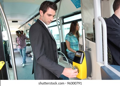 Businessman validating travel card