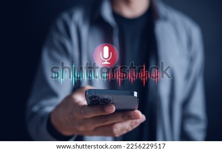 Businessman voice recording the conversation via smartphone with customers, telemarketing, consulting, voice assistance access to information and applications, write a message and send a message.