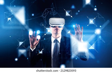 Businessman in vr glasses hands touch digital hologram with fields of information in metaverse, virtual reality and blockchain. Concept of big data - Powered by Shutterstock