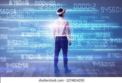 Businessman In Vr Glasses With Variable Fast Changing Numbers Around