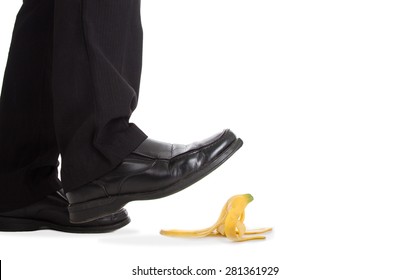 Businessman Walking Foot Press Banana Peel And Slip Fall To Floor.