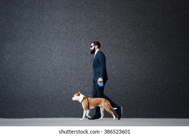 Businessman Walking With His Dog.