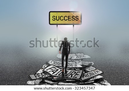 businessman walking in the mist on problems to goal,success concept