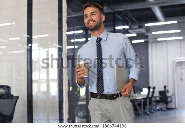 Businessman Walking Office Corridor Takeaway Coffee Stock Photo ...