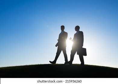 Businessman Walking Together